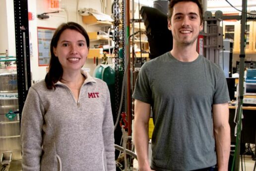 MIT physics graduate student Dahlia Klein (left) and postdoc David MacNeill pose in lab