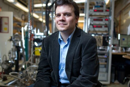 Pablo Jarillo-Herrero sitting in his laboratory