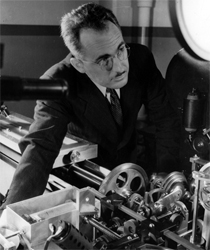 George R. Harrison with his ‘”automatic comparator.”