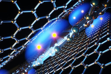 Illustration of electrons against hexagonal pattern