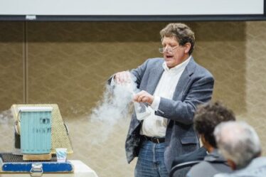 Gregory Francis PhD '87 demonstrates physics experiments