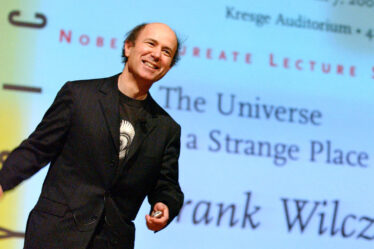 Frank Wilczek on stage at a Nobel Laureate Lecture